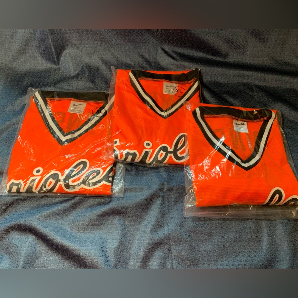 Men’s Orange Orioles V-Neck Shirt, (3) size XL.  New in bag.
